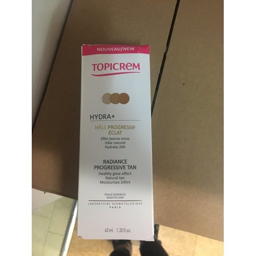 „Topicrem HYDRA+ Radiance“ progresyvaus įdegio kremas